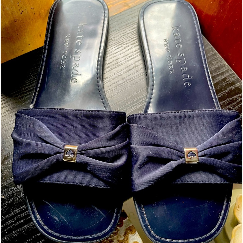 Pair of Navy Blue Kate Spade bow slides.